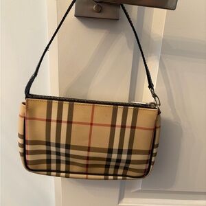 Classic Burberry nova check pouchette in Beige and black.